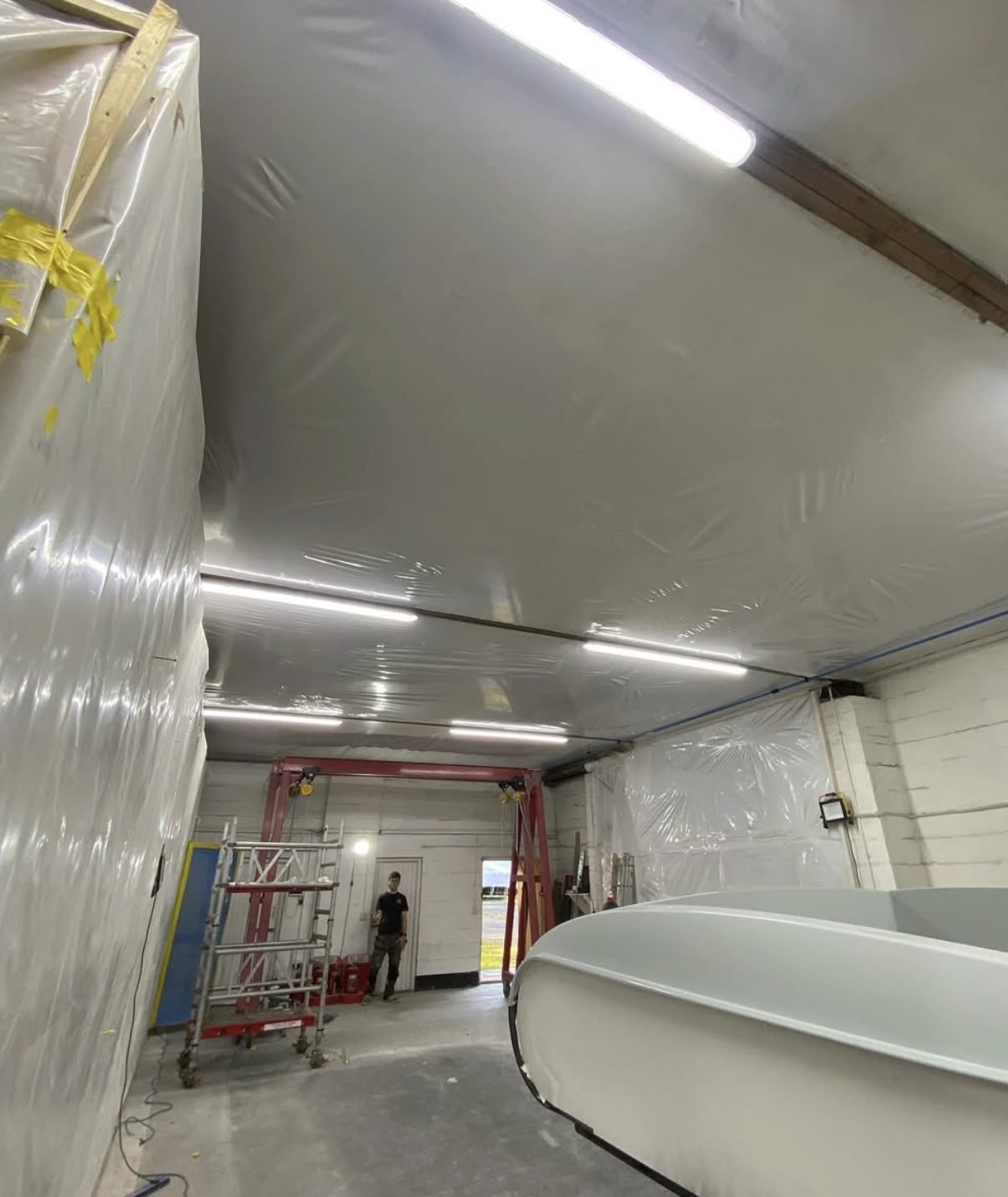 Commercial LED batten lighting installed in a workshop