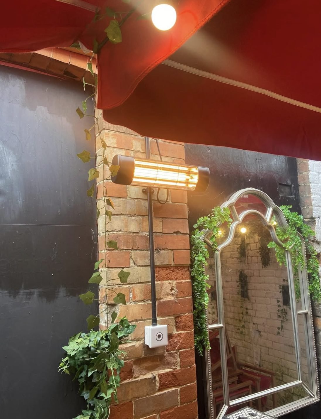 Outdoor patio heater installed at a hospitality venue